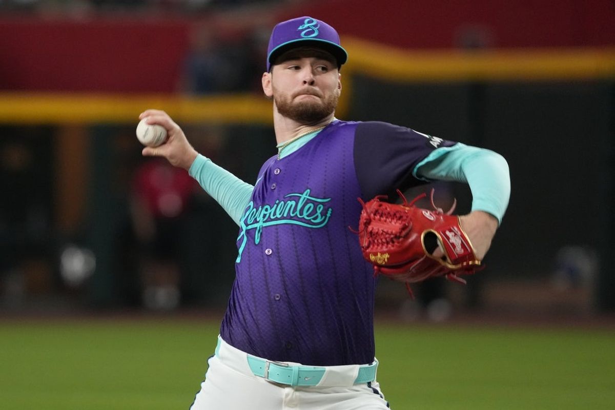 Jul 5, 2025; Phoenix, Arizona, USA; Arizona Diamondbacks relief pitcher Ryne Nelson (19) throws against the Kansas City Royals in the first inning at Chase Field. Mandatory Credit: Rick Scuteri-Imagn Images