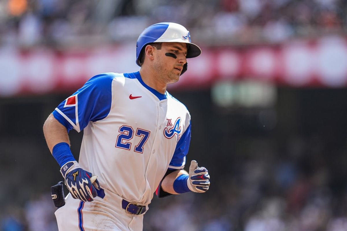 Jul 5, 2025; Cumberland, Georgia, USA; Atlanta Braves third baseman Austin Riley (27) runs after hitting a two run home run against the Baltimore Orioles during the first inning at Truist Park. Mandatory Credit: Dale Zanine-Imagn Images