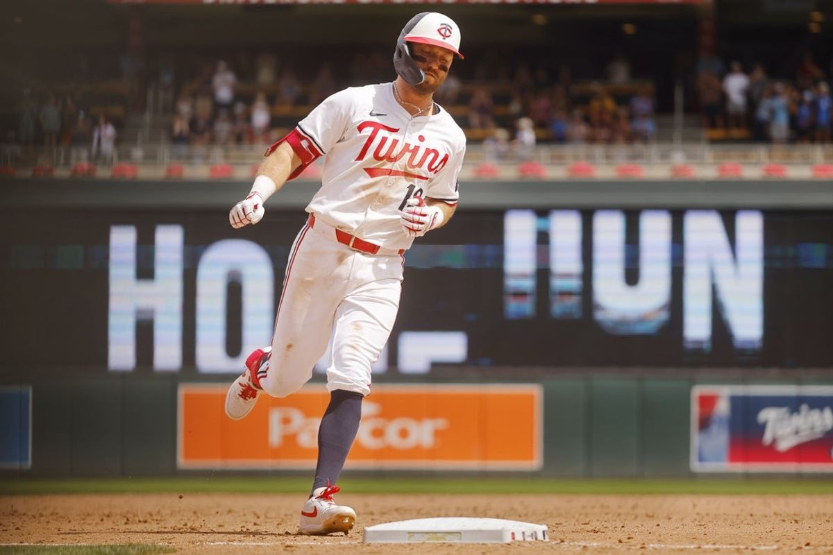 Jul 5, 2025; Minneapolis, Minnesota, USA; Minnesota Twins first baseman Kody Clemens (18) runs the bases after hitting a three-run home run against the Tampa Bay Rays in the sixth inning at Target Field. Mandatory Credit: Bruce Kluckhohn-Imagn Images