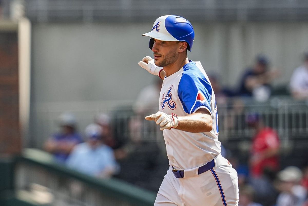 Jul 5, 2025; Cumberland, Georgia, USA; Atlanta Braves first baseman Matt Olson (28) reacts after hitting a home run against the Baltimore Orioles during the third inning at Truist Park. Mandatory Credit: Dale Zanine-Imagn Images