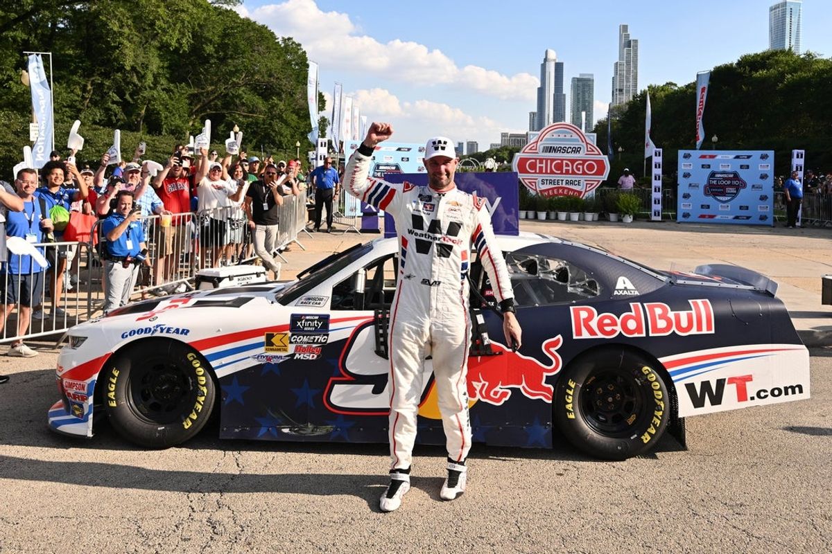 Jul 5, 2025; Chicago, Illinois, USA; Xfinity Series driver Shane van Gisbergen (9) reacts after winning the race during The Loop 110 at Chicago Street Race. Mandatory Credit: Daniel Bartel-Imagn Images