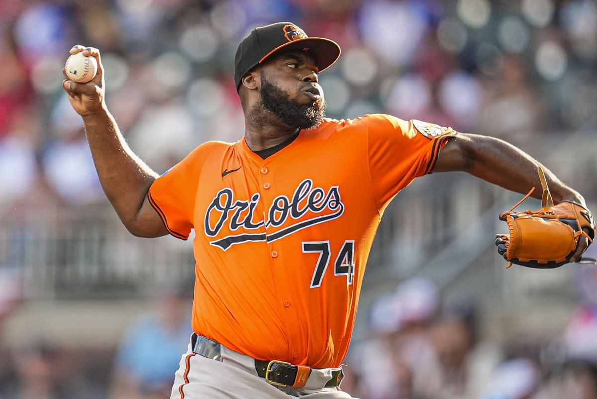 Jul 5, 2025; Cumberland, Georgia, USA; Baltimore Orioles relief pitcher Felix Bautista (74) pitches against the Atlanta Braves during the ninth inning at Truist Park. Mandatory Credit: Dale Zanine-Imagn Images