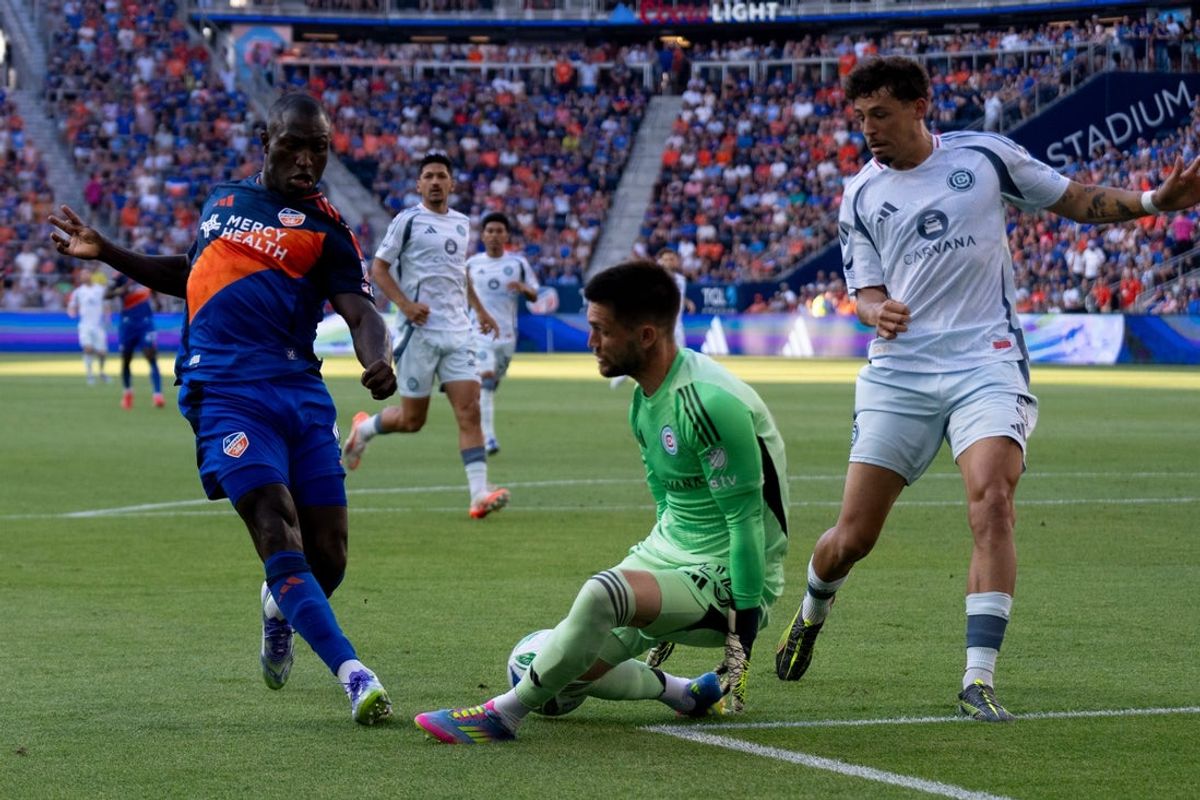 Chicago Fire goalkeeper Jeff Gal (25) defends as FC Cincinnati forward Kévin Denkey (9) attempts to score a goal in the first half at TQL Stadium in Cincinnati, on Saturday, July 5, 2025.