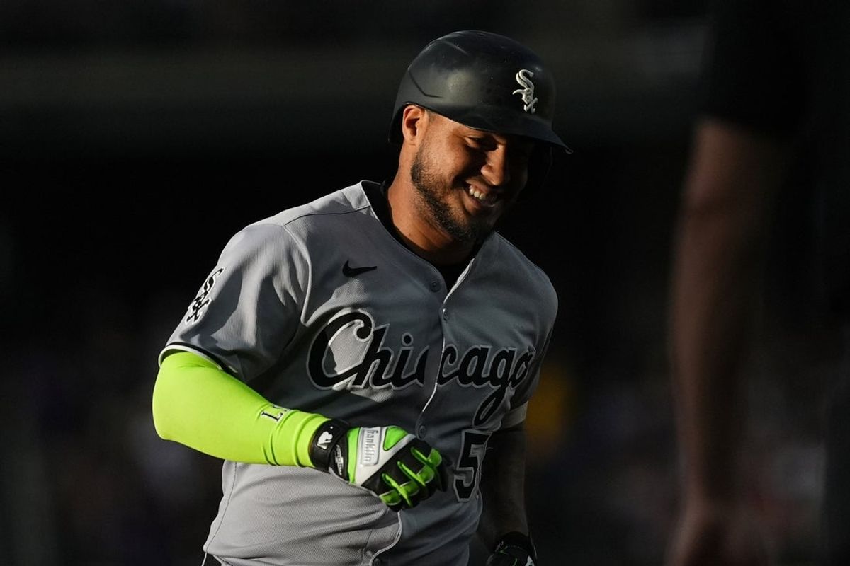 Jul 5, 2025; Denver, Colorado, USA; Chicago White Sox second baseman Lenyn Sosa (50) reacts as he runs the bases after hitting a two-run home run the second inning against the Colorado Rockies at Coors Field. Mandatory Credit: Ron Chenoy-Imagn Images