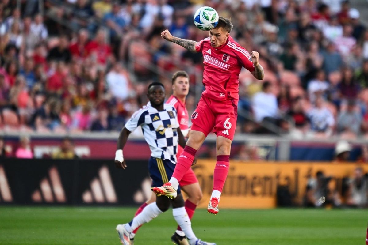 Jul 5, 2025; Sandy, Utah, USA;  St. Louis City SC midfielder Conrad Wallem (6) heads the ball in the first half against Real Salt Lake at America First Field. Mandatory Credit: Jamie Sabau-Imagn Images