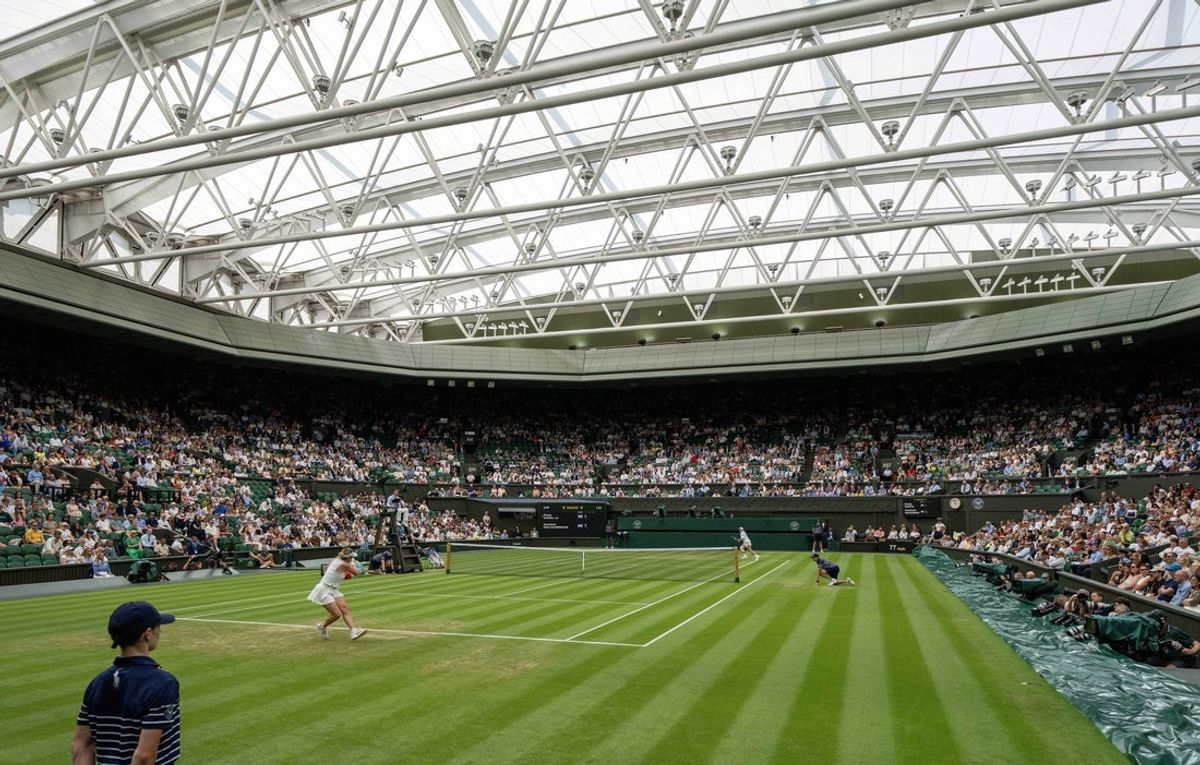Jul 6, 2025; Wimbledon, United Kingdom; General view of Centre Court with the roof closed during the Anastasia Pavlyuchenkova and Sonny Kartal of Great Britain match on day seven at the All England Lawn Tennis and Croquet Club. Mandatory Credit: Susan Mullane-Imagn Images