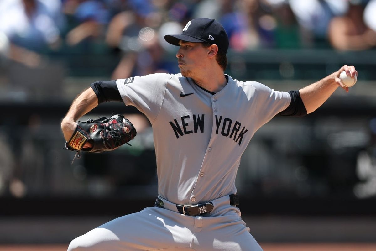 Jul 6, 2025; New York City, New York, USA; New York Yankees starting pitcher Max Fried (54) delivers a pitch during the first inning against the New York Mets at Citi Field. Mandatory Credit: Vincent Carchietta-Imagn Images