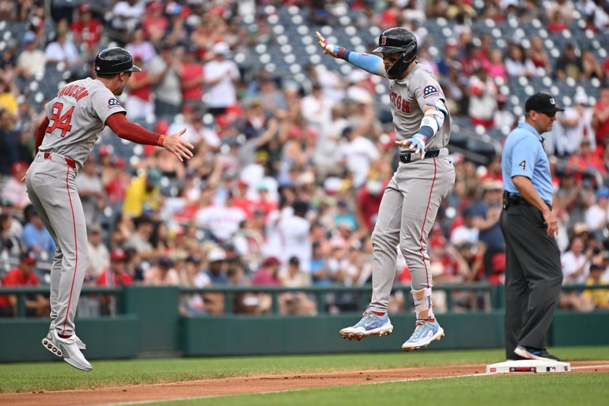 Jul 6, 2025; Washington, District of Columbia, USA; Boston Red Sox shortstop Trevor Story (10) celebrates with third base coach/outfield instructor Kyle Hudson (84) after hitting a two run home run against the Washington Nationals during the first inning at Nationals Park. Mandatory Credit: Rafael Suanes-Imagn Images