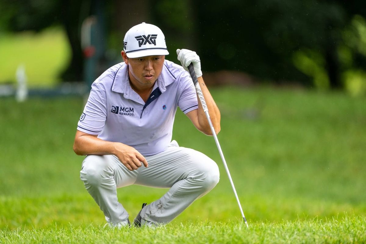 Jul 6, 2025; Silvis, Illinois, USA; David Lipsky lines up a shot on the 9th hole during the final round of the John Deere Classic golf tournament. Mandatory Credit: Marc Lebryk-Imagn Images