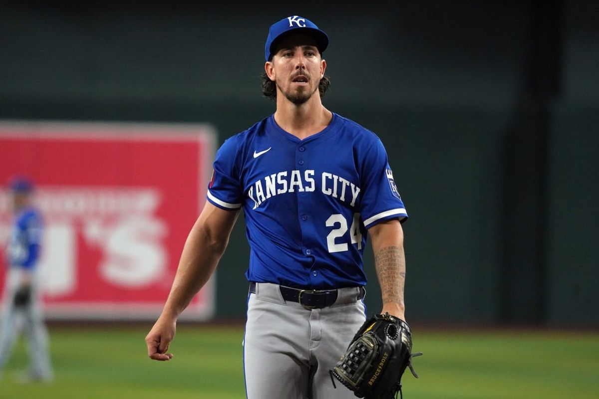 Jul 6, 2025; Phoenix, Arizona, USA; Kansas City Royals pitcher Michael Lorenzen (24) throws against the Arizona Diamondbacks in the first inning at Chase Field. Mandatory Credit: Rick Scuteri-Imagn Images