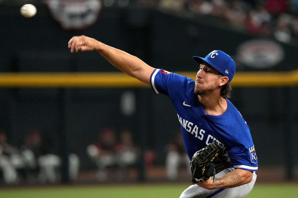 Jul 6, 2025; Phoenix, Arizona, USA; Kansas City Royals pitcher Michael Lorenzen (24) throws against the Arizona Diamondbacks in the first inning at Chase Field. Mandatory Credit: Rick Scuteri-Imagn Images