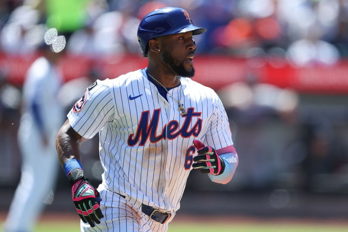 Jul 6, 2025; New York City, New York, USA; New York Mets left fielder Starling Marte (6) singles during the sixth inning against the New York Yankees at Citi Field. Mandatory Credit: Vincent Carchietta-Imagn Images