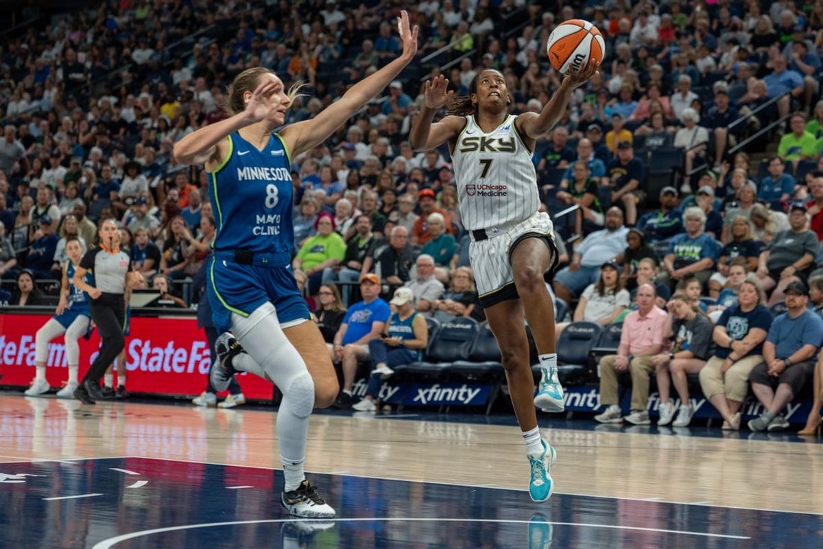 Jul 6, 2025; Minneapolis, Minnesota, USA; Chicago Sky guard Ariel Atkins (7) drives to the basket defended by Minnesota Lynx forward Alanna Smith (8) in the first quarter at Target Center. Mandatory Credit: Matt Blewett-Imagn Images