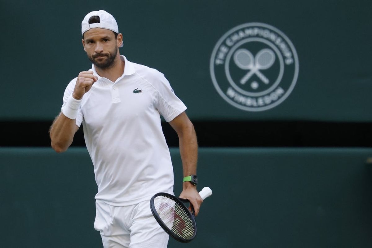 Jul 7, 2025; Wimbledon, United Kingdom; Grigor Dimitrov (BUL) reacts after winning the second set against Jannik Sinner (ITA)(not pictured) on day eight of The Championships Wimbledon 2025 at All England Lawn Tennis and Croquet Club. Mandatory Credit: Geoff Burke-Imagn Images