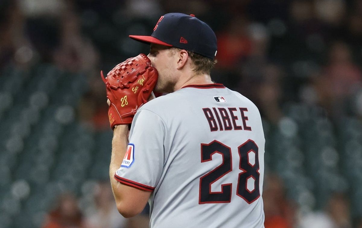 Jul 7, 2025; Houston, Texas, USA;  Cleveland Guardians starting pitcher Tanner Bibee (28) get set to pitch against the Houston Astros in the first inning at Daikin Park. Mandatory Credit: Thomas Shea-Imagn Images