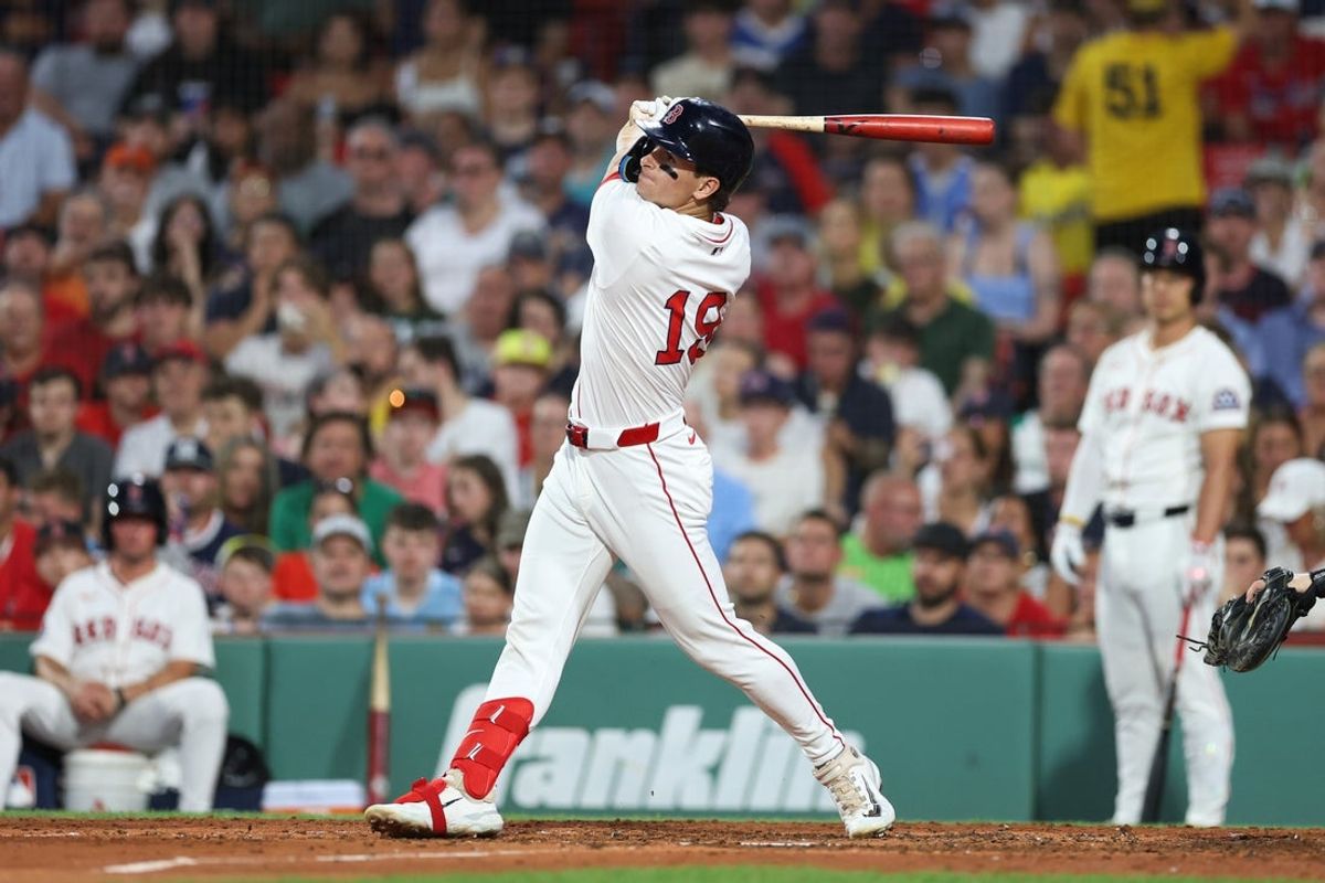 Jul 7, 2025; Boston, Massachusetts, USA; Boston Red Sox designated hitter Roman Anthony (19) hits a two run home run during the fifth inning against the Colorado Rockies at Fenway Park. Mandatory Credit: Paul Rutherford-Imagn Images