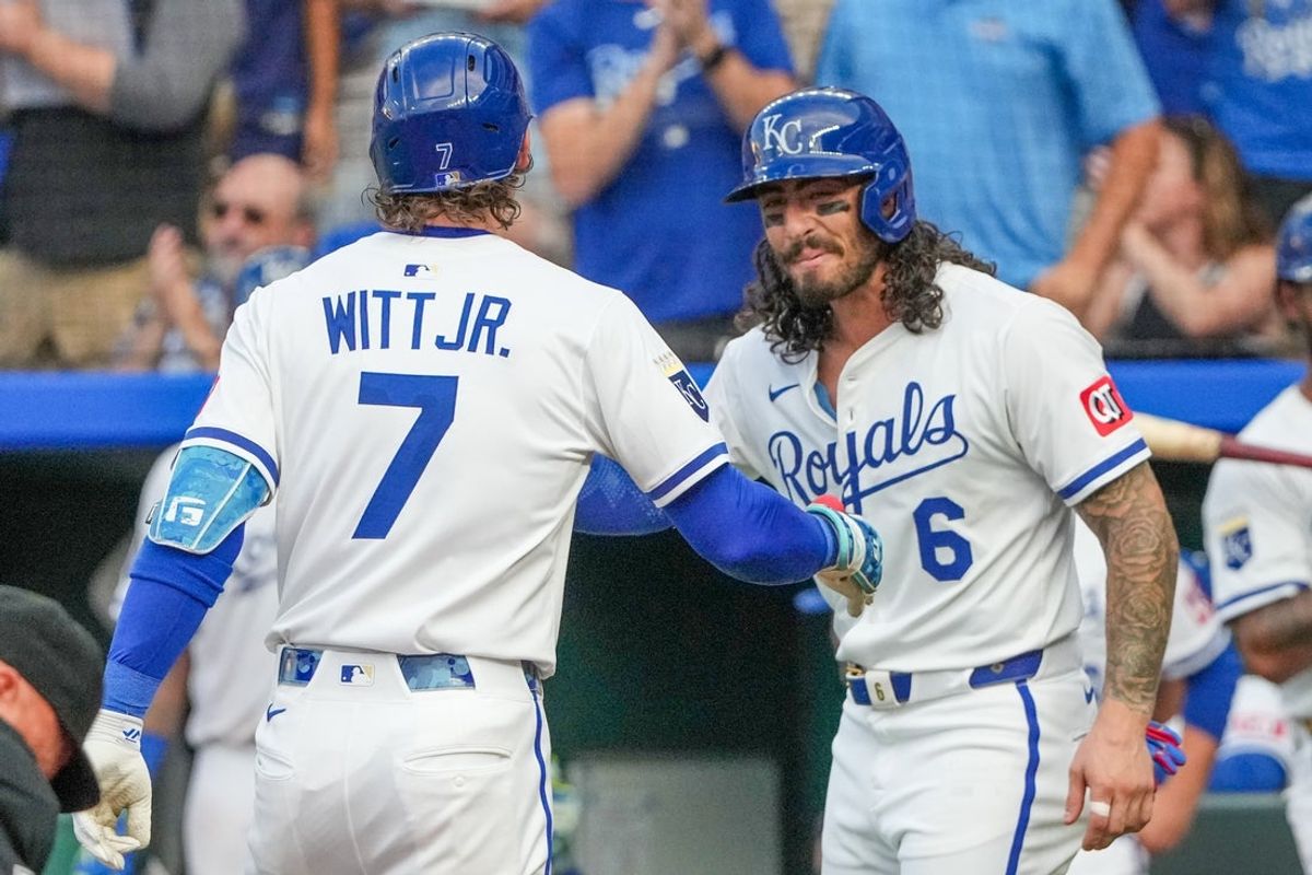 Jul 7, 2025; Kansas City, Missouri, USA; Kansas City Royals shortstop Bobby Witt Jr. (7) celebrates with second baseman Jonathan India (6) after hitting a two run home run against the Pittsburgh Pirates during the third inning at Kauffman Stadium. Mandatory Credit: Denny Medley-Imagn Images