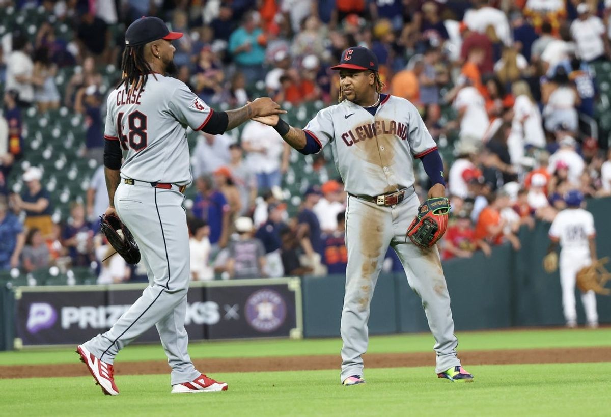 Jul 7, 2025; Houston, Texas, USA;  Cleveland Guardians relief pitcher Emmanuel Clase (48) celebrates with third baseman Jose Ramirez (11) after defeating the Houston Astros at Daikin Park. Mandatory Credit: Thomas Shea-Imagn Images