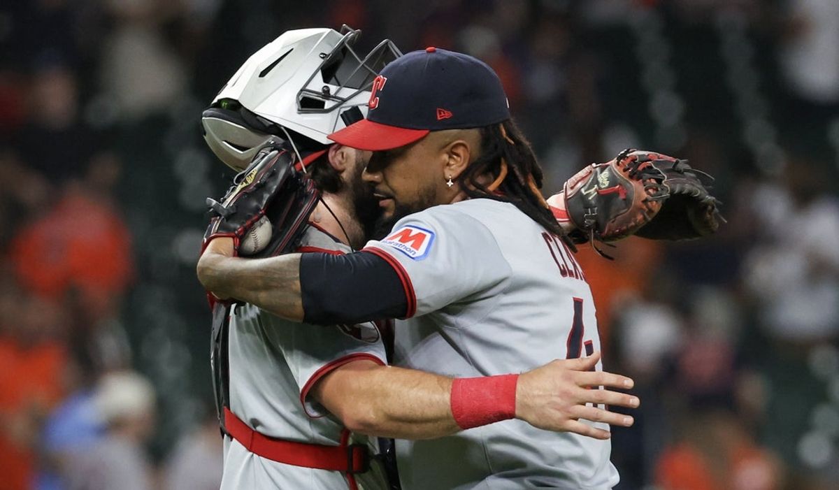 Jul 7, 2025; Houston, Texas, USA;  Cleveland Guardians catcher Bo Naylor (23) hugs relief pitcher Emmanuel Clase (48) after defeating the Houston Astros at Daikin Park. Mandatory Credit: Thomas Shea-Imagn Images
