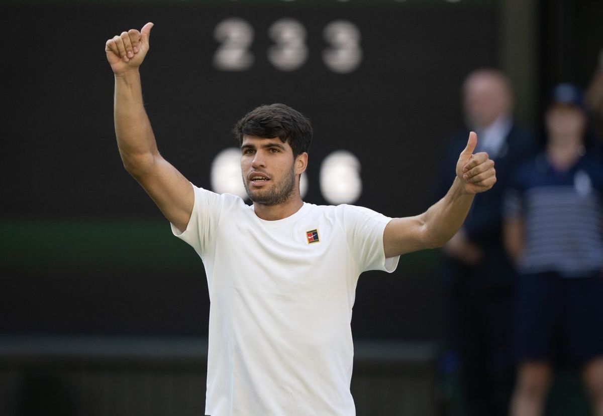 Jul 8, 2025; Wimbledon, United Kingdom; Carlos Alcaraz of Spain celebrates winning his match against Cameron Norrie of Great Britain on day nine at All England Lawn Tennis and Croquet Club. Mandatory Credit: Susan Mullane-Imagn Images