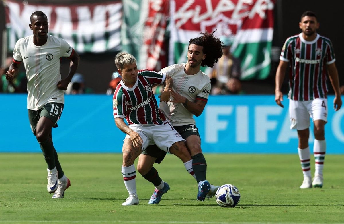 [Subscription Customers Only] Jul 8, 2025; East Rutherford, New Jersey, USA; Fluminense FC forward Yeferson Soteldo (7) in action with Chelsea FC defender Marc Cucurella (3) during a semifinal match of the 2025 FIFA Club World Cup at MetLife Stadium. Mandatory Credit: Amanda Perobelli-Reuters via Imagn Images