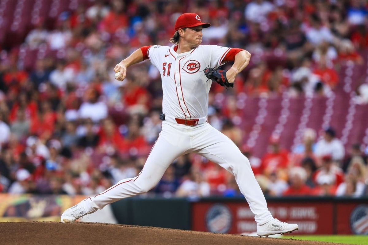 Jul 7, 2025; Cincinnati, Ohio, USA; Cincinnati Reds starting pitcher Brady Singer (51) pitches against the Miami Marlins in the first inning at Great American Ball Park. Mandatory Credit: Katie Stratman-Imagn Images