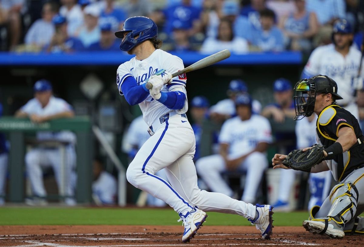 Jul 8, 2025; Kansas City, Missouri, USA; Kansas City Royals shortstop Bobby Witt Jr. (7) hits a single during the first inning against the Pittsburgh Pirates at Kauffman Stadium. Mandatory Credit: Jay Biggerstaff-Imagn Images