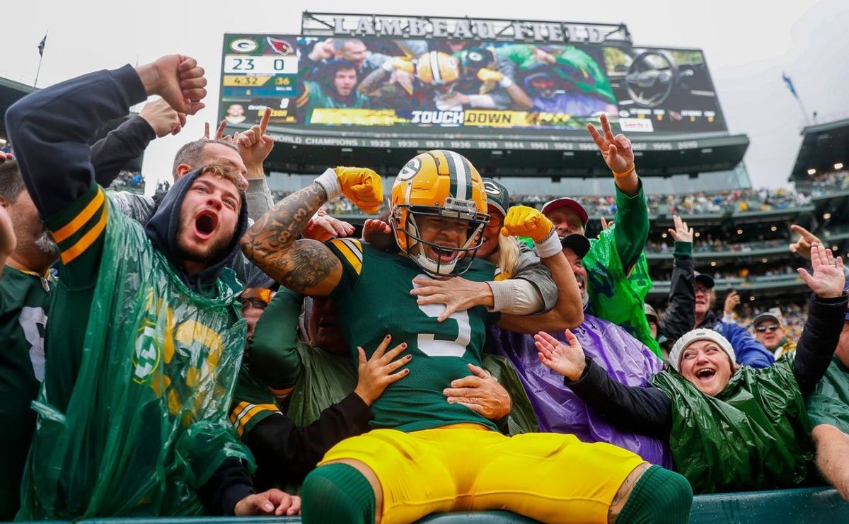 Green Bay Packers wide receiver Christian Watson (9) flexes as he does a “Lambeau Leap” with Packers fans after scoring a touchdown against the Arizona Cardinals on Sunday, October 13, 2024, at Lambeau Field in Green Bay, Wis. The Packers won the game, 34-13
Tork Mason/USA TODAY NETWORK-Wisconsin