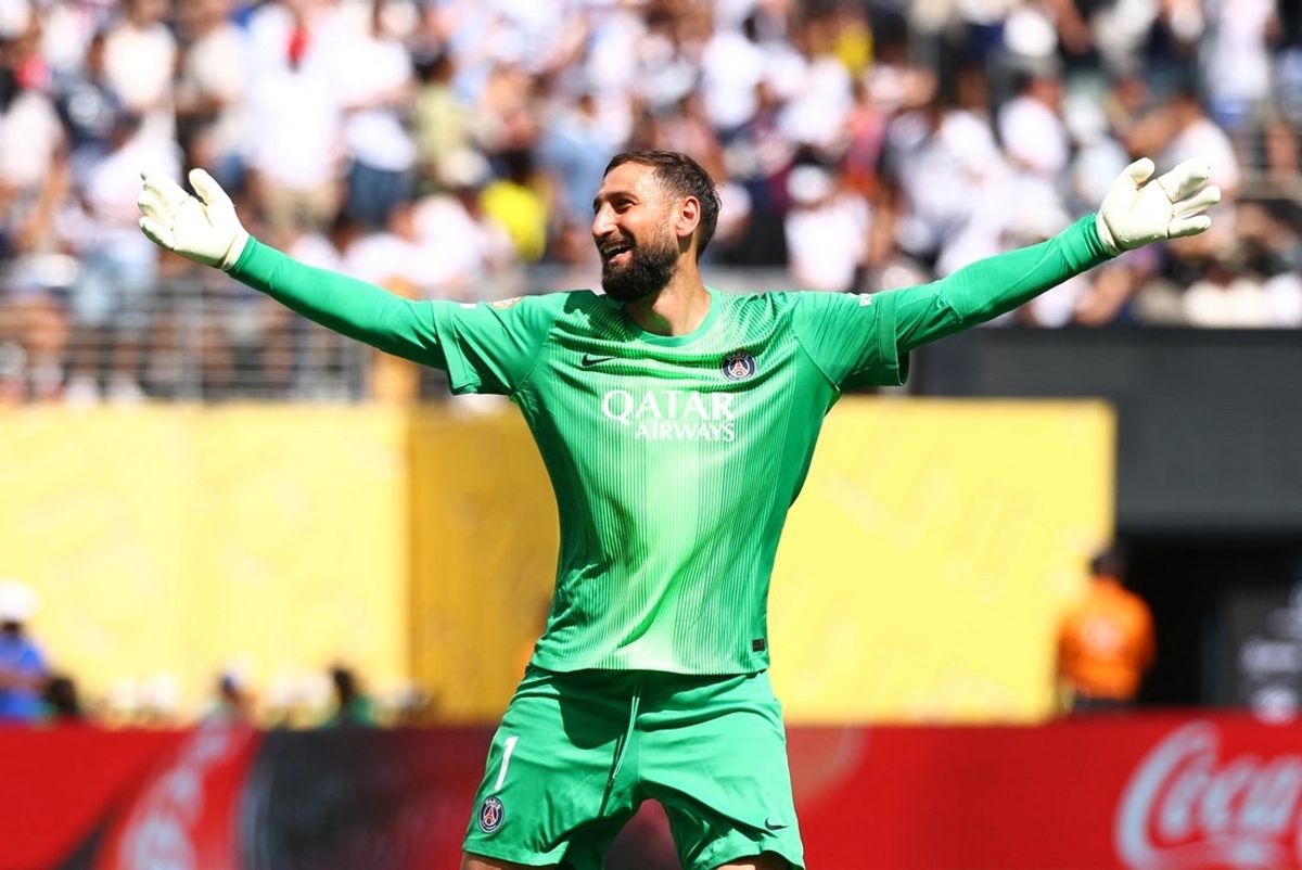 [Subscription Customers Only] Jul 9, 2025; East Rutherford, New Jersey, USA; Paris Saint-Germain goalkeeper Gianluigi Donnarumma (1) celebrates after midfielder Fabian Ruiz (8) scores their third goal during a semifinal match of the 2025 FIFA Club World Cup at MetLife Stadium. Mandatory Credit: Kai Pfaffenbach-Reuters via Imagn Images