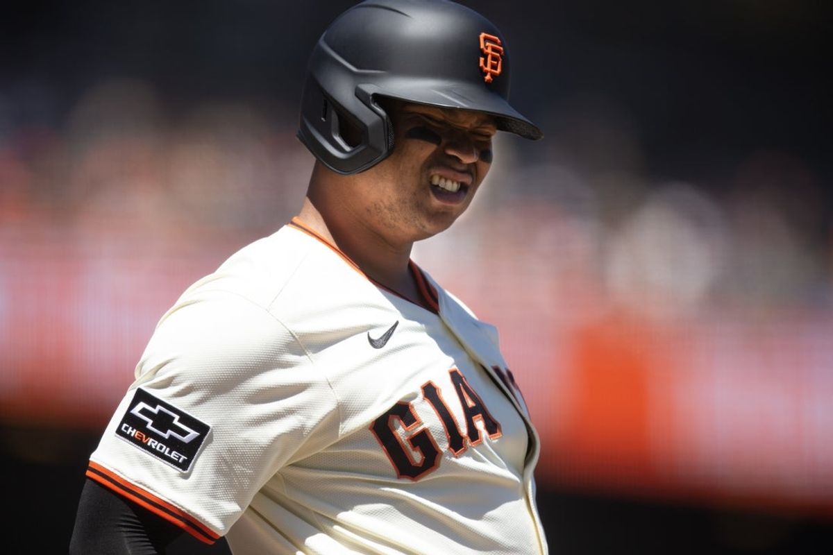 Jul 9, 2025; San Francisco, California, USA; San Francisco Giants designated hitter Rafael Devers (16) reacts to a called strike during the sixth inning against the Philadelphia Phillies at Oracle Park. Mandatory Credit: D. Ross Cameron-Imagn Images