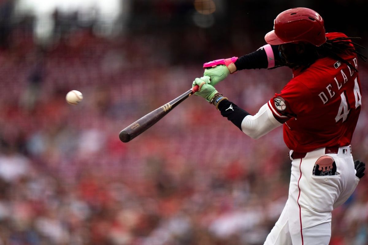 Cincinnati Reds shortstop Elly De La Cruz (44) hits a base hit in the first inning between Cincinnati Reds and Miami Marlins at Great American Ball Park in Cincinnati on Wednesday, July 9, 2025.