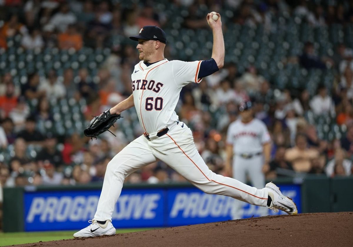 Jul 9, 2025; Houston, Texas, USA;Houston Astros starting pitcher Brandon Walter (60) pitches against the Cleveland Guardians  in the first inning  at Daikin Park. Mandatory Credit: Thomas Shea-Imagn Images