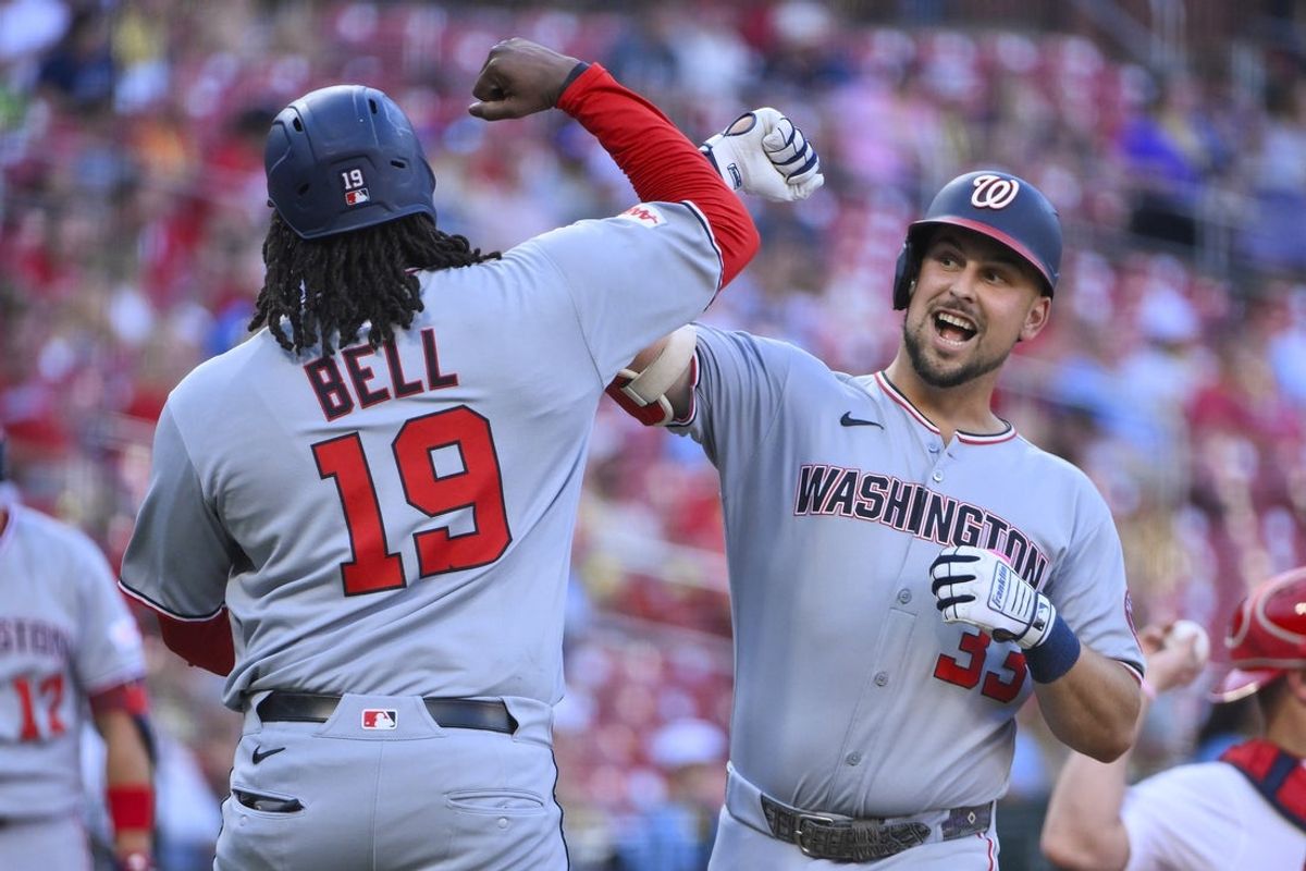 Jul 9, 2025; St. Louis, Missouri, USA;  Washington Nationals first baseman Nathaniel Lowe (33) celebrates with designated hitter Josh Bell (19) after hitting a three run home run against the St. Louis Cardinals during the first inning at Busch Stadium. Mandatory Credit: Jeff Curry-Imagn Images