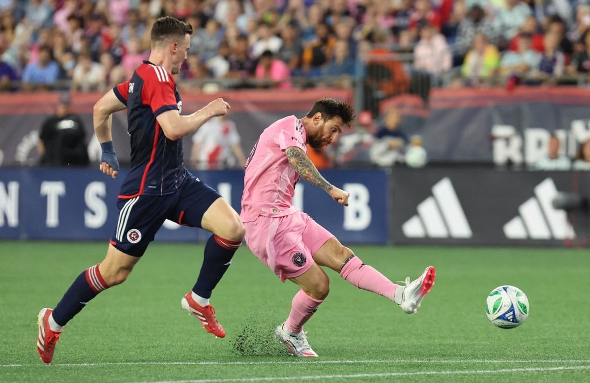 Inter Miami CF palyer Lionel Messi scores his second goal of the game on this play against New England Revolution defender Tanner Beason at Gillette Stadium Wednesday, July 9, 2025.