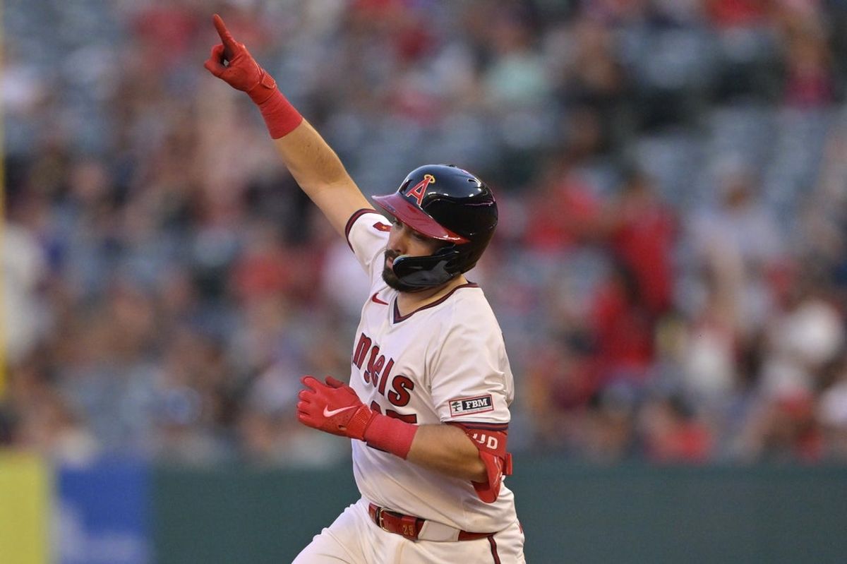 Jul 9, 2025; Anaheim, California, USA;  Los Angeles Angels catcher Travis d'Arnaud (25) rounds the bases after hitting a solo home run in the fourth inning against the Texas Rangers at Angel Stadium. Mandatory Credit: Jayne Kamin-Oncea-Imagn Images