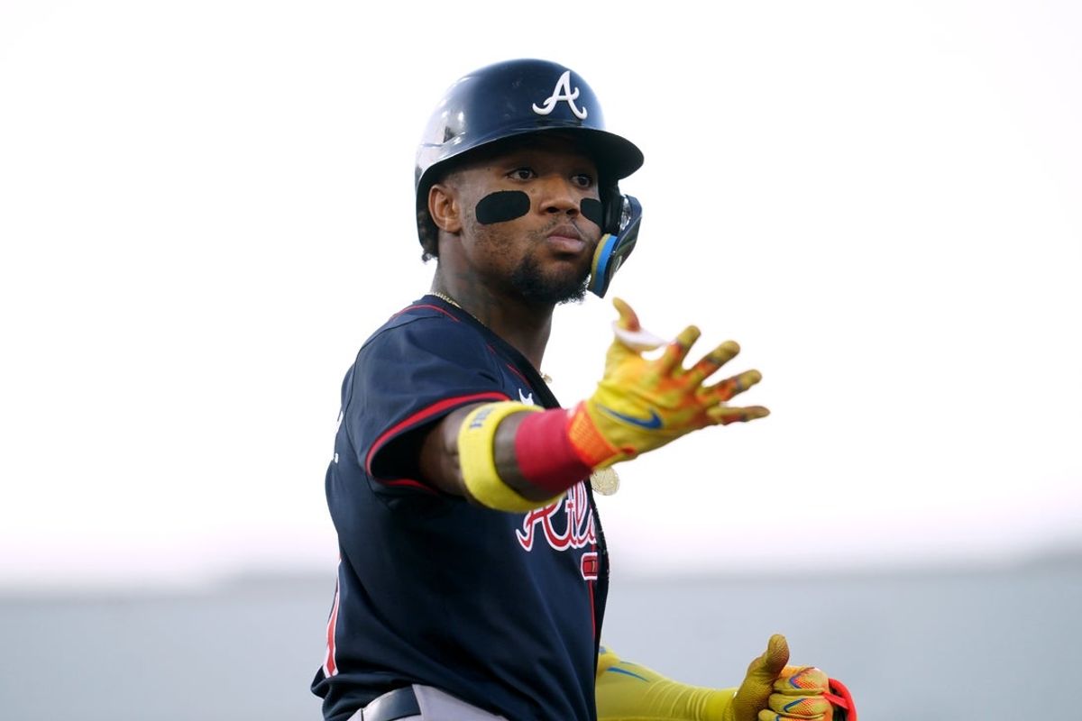 Jul 9, 2025; West Sacramento, California, USA; Atlanta Braves right fielder Ronald Acuna Jr. (13) reacts after hitting a home run against the Athletics in the fourth inning at Sutter Health Park. Mandatory Credit: Cary Edmondson-Imagn Images
