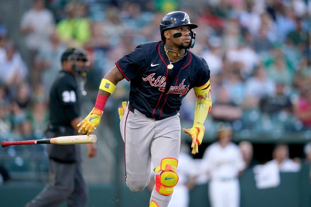Jul 9, 2025; West Sacramento, California, USA; Atlanta Braves right fielder Ronald Acuna Jr. (13) reacts after hitting a home run against the Athletics in the fourth inning at Sutter Health Park. Mandatory Credit: Cary Edmondson-Imagn Images