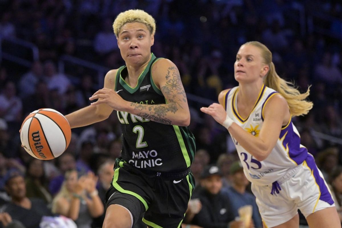 Jul 10, 2025; Los Angeles, California, USA;  Minnesota Lynx guard Natisha Hiedeman (2) drives past Los Angeles Sparks guard Julie Vanloo (35) in the first half at Crypto.com Arena. Mandatory Credit: Jayne Kamin-Oncea-Imagn Images