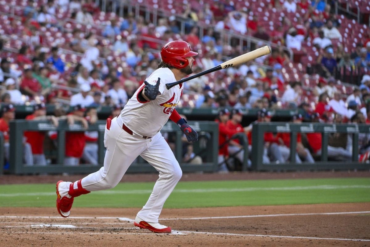 Jul 10, 2025; St. Louis, Missouri, USA;  St. Louis Cardinals right fielder Alec Burleson (41) hits a one run single against the Washington Nationals during the third inning at Busch Stadium. Mandatory Credit: Jeff Curry-Imagn Images