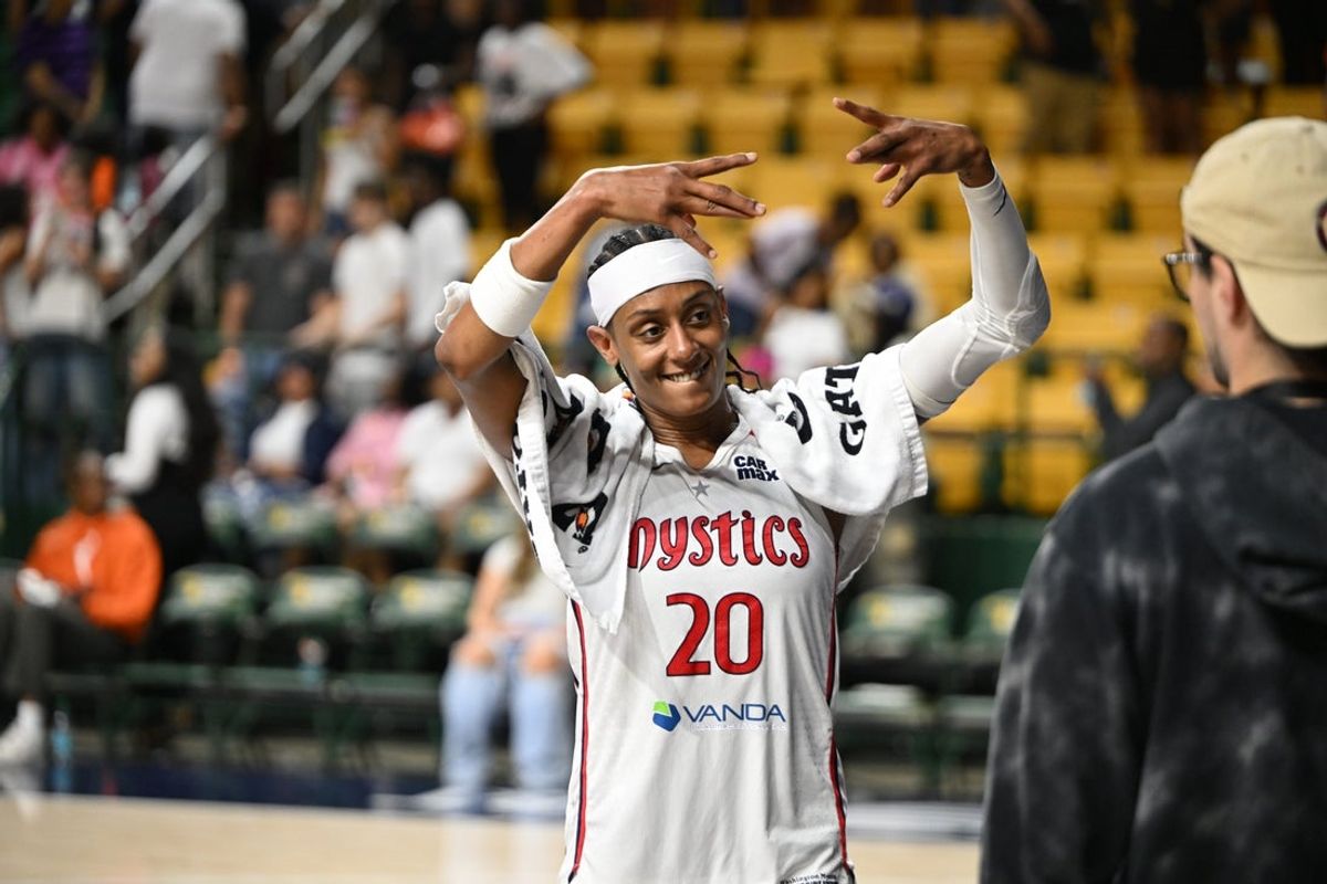 Jul 10, 2025; Washington, District of Columbia, USA; Washington Mystics guard Brittney Sykes (20) celebrates while walking off the court after defeating the Las Vegas Aces at EagleBank Arena. Mandatory Credit: Rafael Suanes-Imagn Images