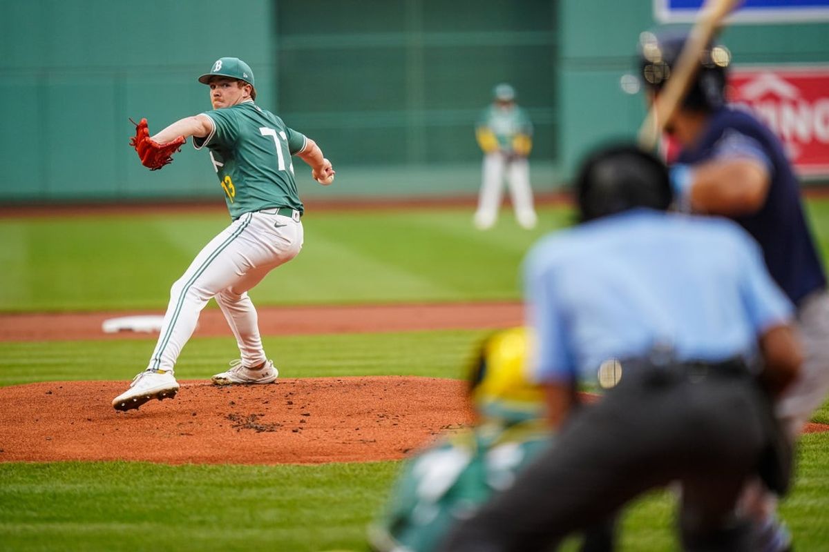 Jul 11, 2025; Boston, Massachusetts, USA; Boston Red Sox pitcher Hunter Dobbins (73) throws a pitch against the Tampa Bay Rays in the first inning at Fenway Park. Mandatory Credit: David Butler II-Imagn Images