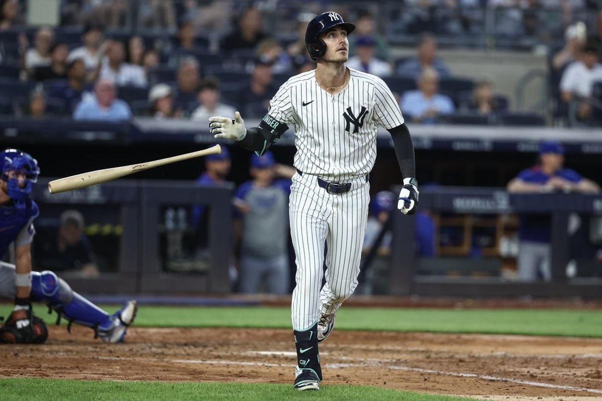 Jul 11, 2025; Bronx, New York, USA;  New York Yankees center fielder Cody Bellinger (35) hits a two run home run in the fifth inning against the Chicago Cubs at Yankee Stadium. Mandatory Credit: Wendell Cruz-Imagn Images