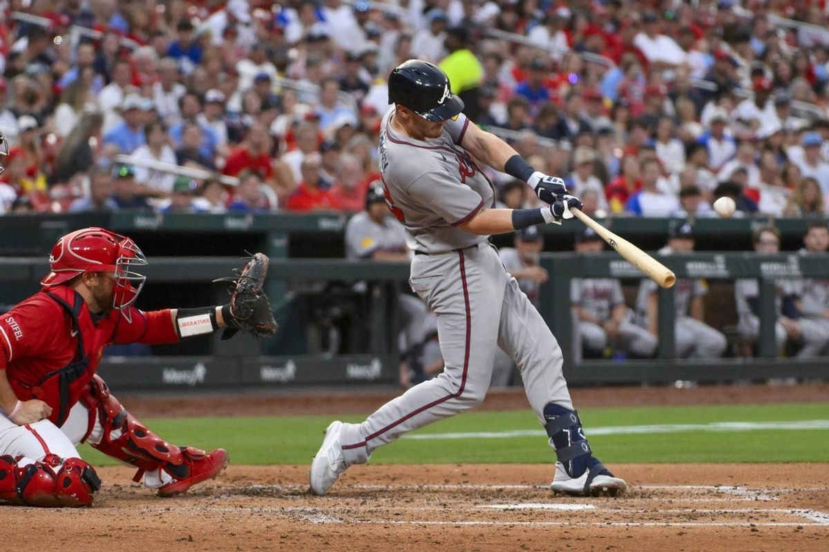 Jul 11, 2025; St. Louis, Missouri, USA;  Atlanta Braves designated hitter Sean Murphy (12) hits a solo home run against the St. Louis Cardinals during the third inning at Busch Stadium. Mandatory Credit: Jeff Curry-Imagn Images
