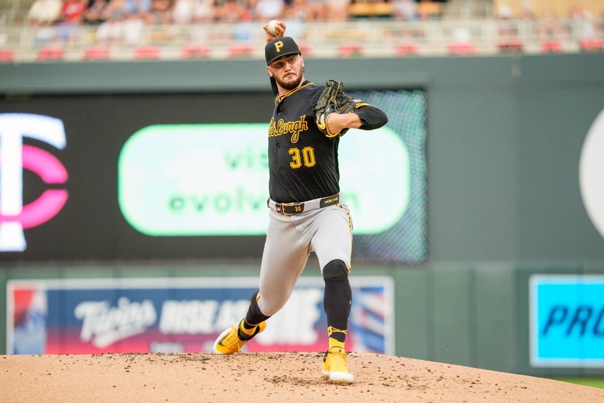 Jul 11, 2025; Minneapolis, Minnesota, USA; Pittsburgh Pirates starting pitcher Paul Skenes (30) pitches to the Minnesota Twins in the first inning at Target Field. Mandatory Credit: Matt Blewett-Imagn Images
