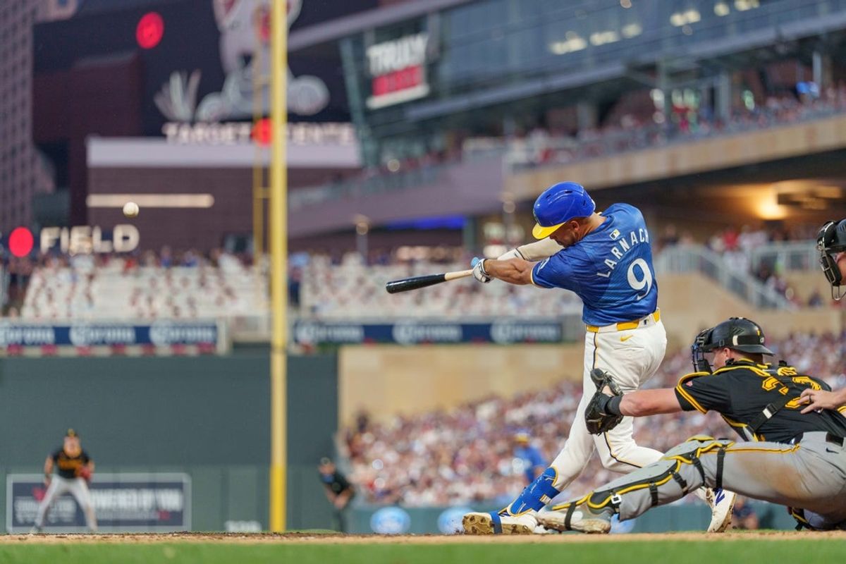 Jul 11, 2025; Minneapolis, Minnesota, USA; Minnesota Twins designated hitter Trevor Larnach (9) hits a two-run hime run off Pittsburgh Pirates starting pitcher Paul Skenes (30) in the fourth inning at Target Field. Mandatory Credit: Matt Blewett-Imagn Images