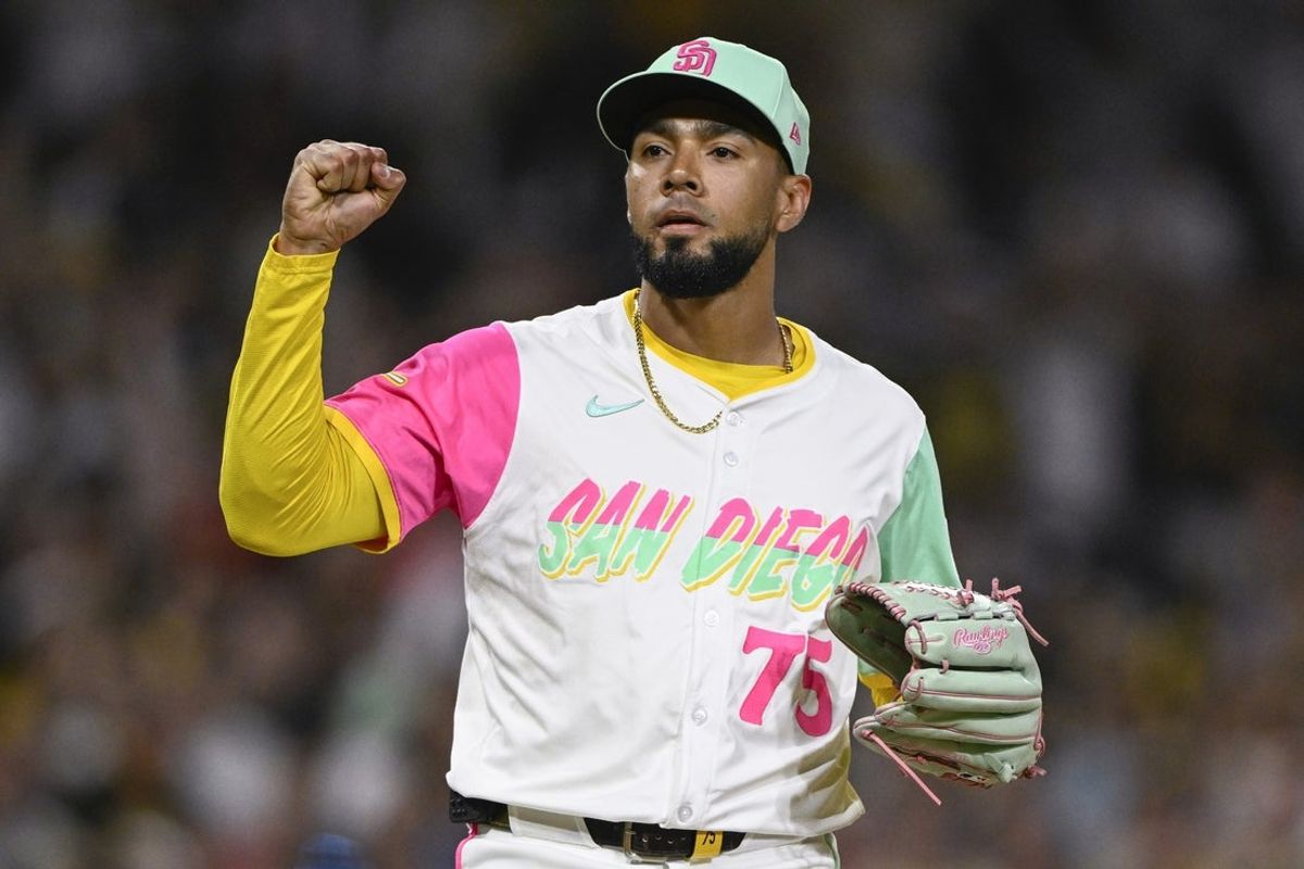 Jul 11, 2025; San Diego, California, USA; San Diego Padres relief pitcher Robert Suarez (75) pumps his fist after the Padres defeated the Philadelphia Phillies at Petco Park. Mandatory Credit: Denis Poroy-Imagn Images
