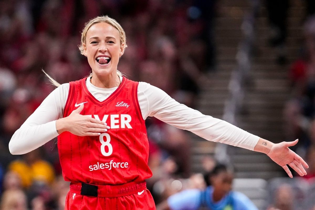 Indiana Fever guard Sophie Cunningham (8) celebrates Friday, July 11, 2025, during a game between the Indiana Fever and the Atlanta Dream at Gainbridge Fieldhouse in Indianapolis. The Indiana Fever defeated the Atlanta Dream, 99-82.