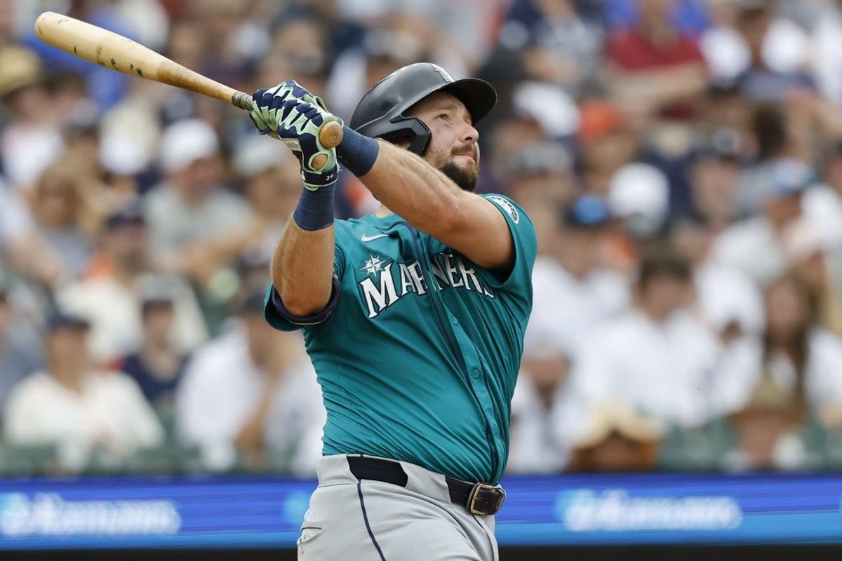 Jul 12, 2025; Detroit, Michigan, USA; Seattle Mariners catcher Cal Raleigh (29) hits a sacrifice fly in the third inning against the Detroit Tigers at Comerica Park. Mandatory Credit: Rick Osentoski-Imagn Images