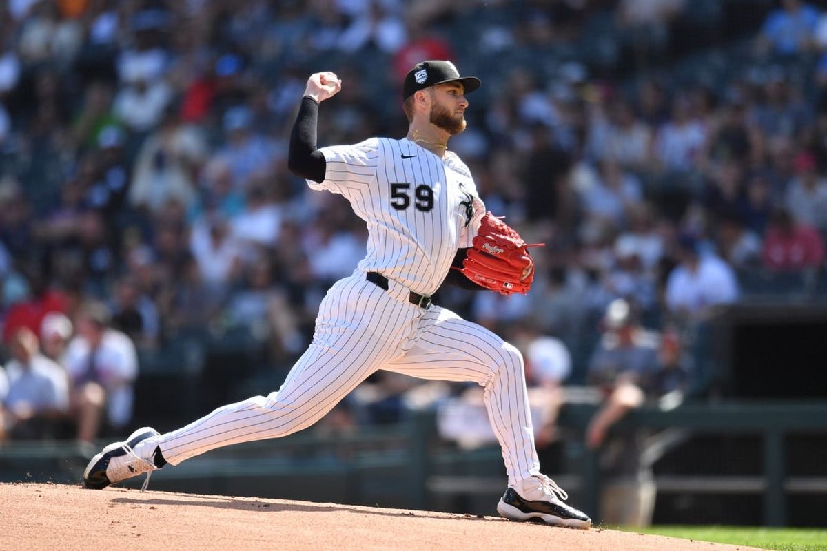 Jul 12, 2025; Chicago, Illinois, USA; Chicago White Sox starting pitcher Sean Burke (59) pitches during the first inning against the Cleveland Guardians at Rate Field. Mandatory Credit: Patrick Gorski-Imagn Images