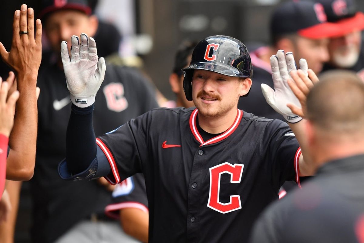 Jul 12, 2025; Chicago, Illinois, USA; Cleveland Guardians designated hitter Kyle Manzardo (9) celebrates his home run with teammates in the dugout during the sixth inning against the Chicago White Sox at Rate Field. Mandatory Credit: Patrick Gorski-Imagn Images
